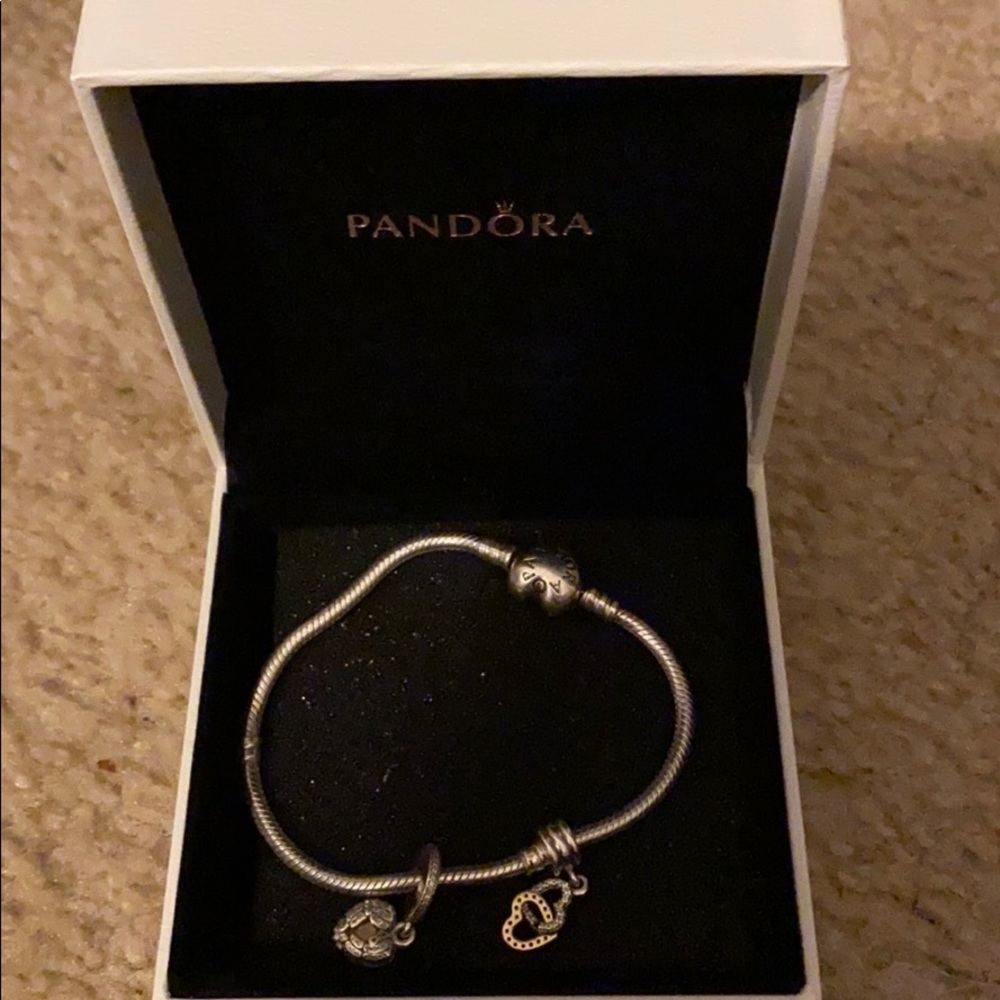 Pandora bracelet charms included